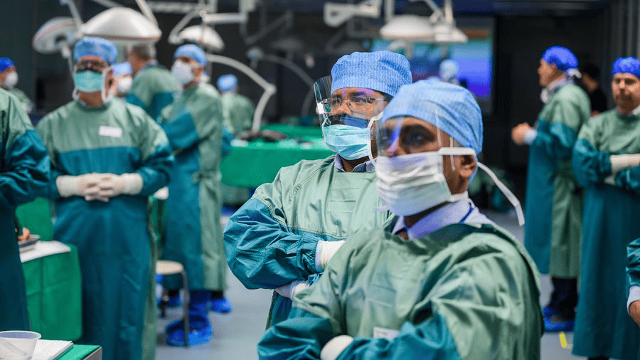 Surgeons in the operating room during an AO CMF educational event